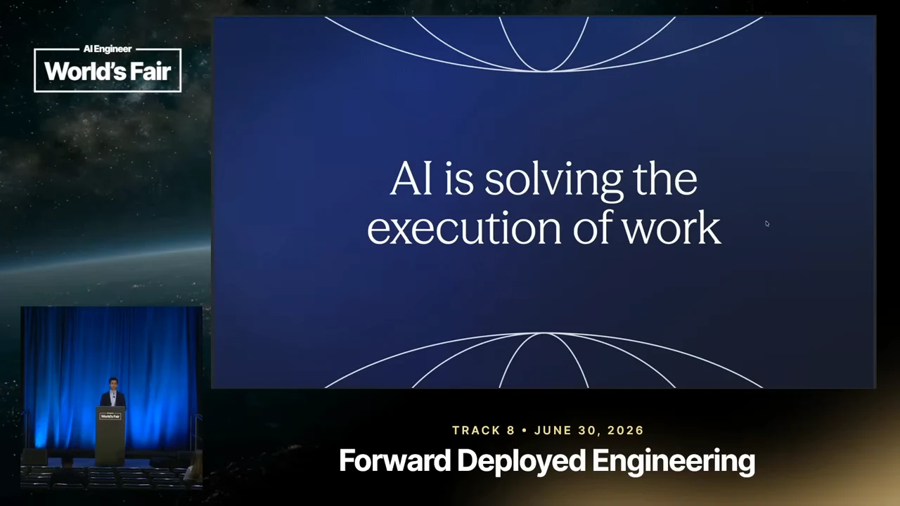 Blue slide reading “AI is solving the execution of work,” framed by curved white lines, with a speaker inset at left.