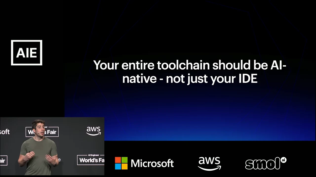 Large white statement about making the entire toolchain AI-native on a black and blue slide, with the speaker inset below.