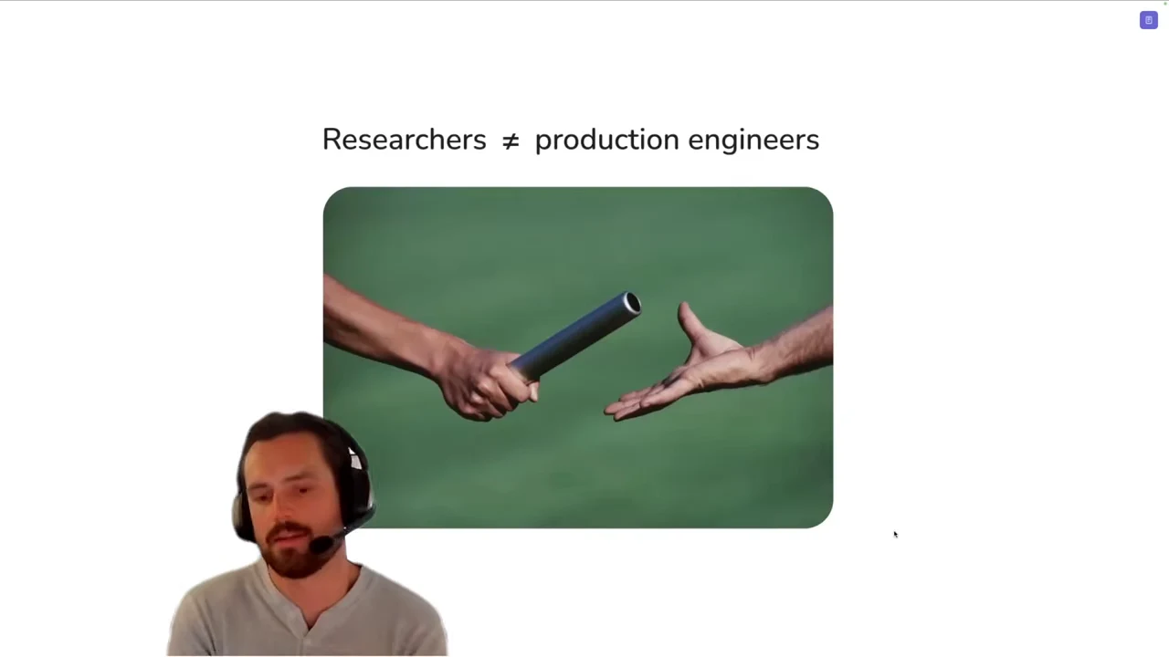 Slide titled “Researchers ≠ production engineers” above a photograph of hands passing a relay baton.