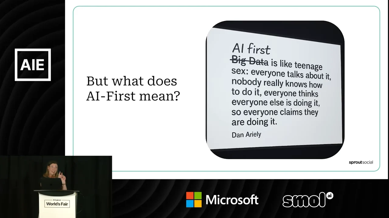 Slide asking what AI-First means, beside a quotation comparing widespread claims of adoption to teenage sex, with “Big Data” crossed out and replaced by “AI first.”