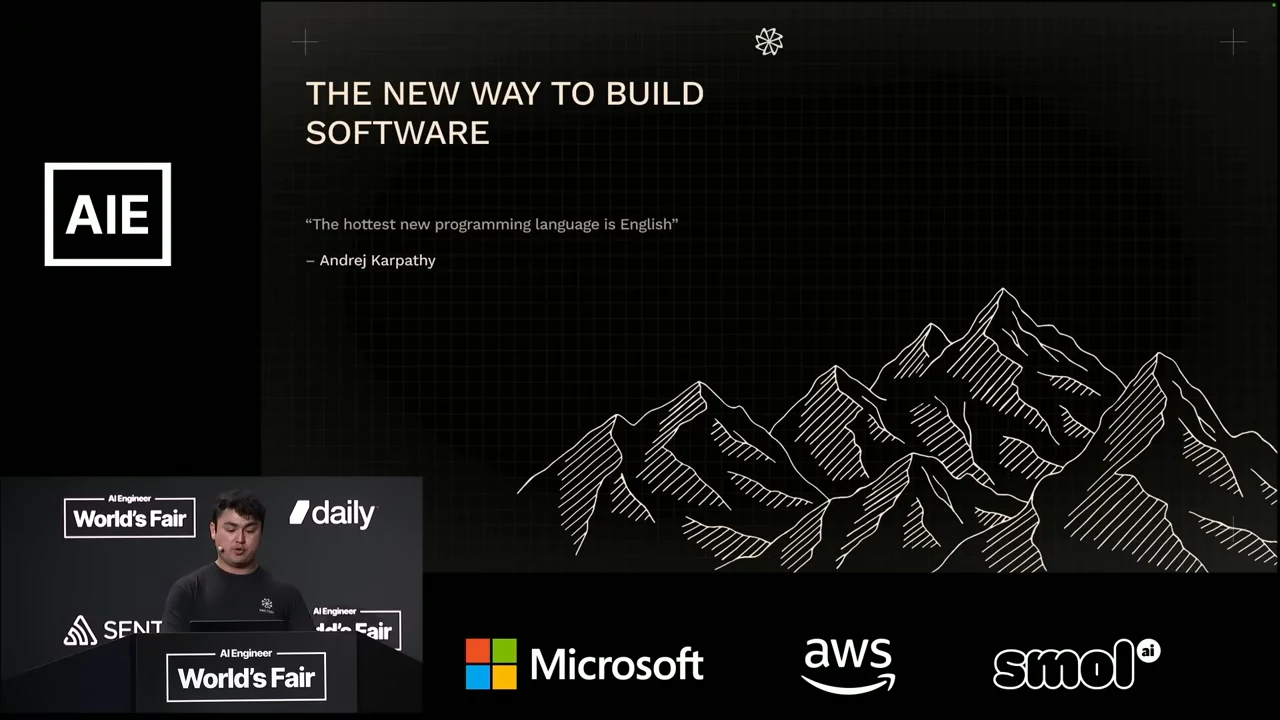 Slide titled “The new way to build software,” with the quote “The hottest new programming language is English” attributed to Andrej Karpathy above line drawings of mountains.