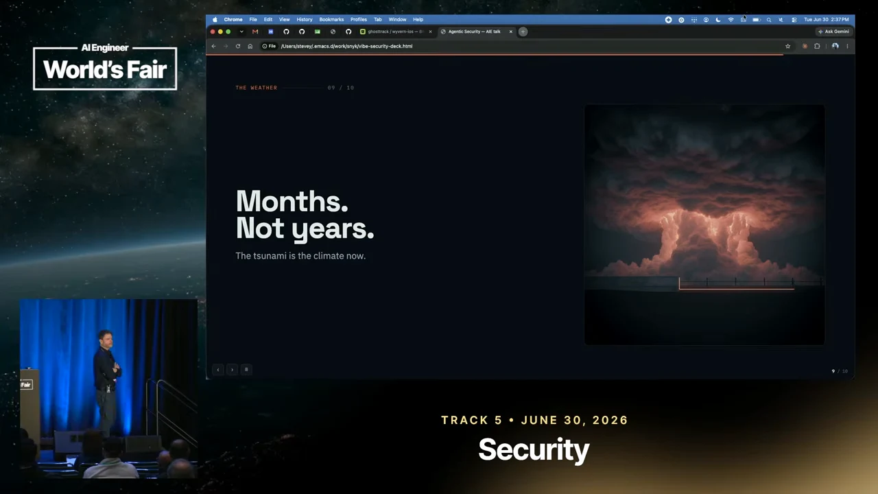 Slide reading “Months. Not years.” and “The tsunami is the climate now,” beside an orange-lit storm cloud, with the speaker inset at left.