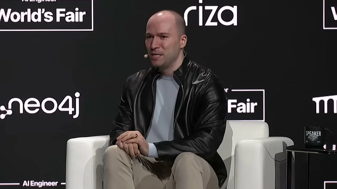 Greg Brockman seated on the AI Engineer World’s Fair stage during the opening conversation.