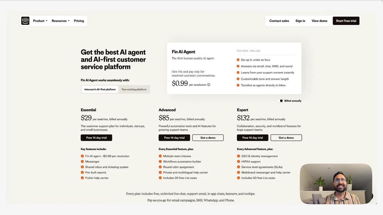 Intercom pricing page with a Fin AI Agent card above three plan columns and a presenter inset at bottom right.