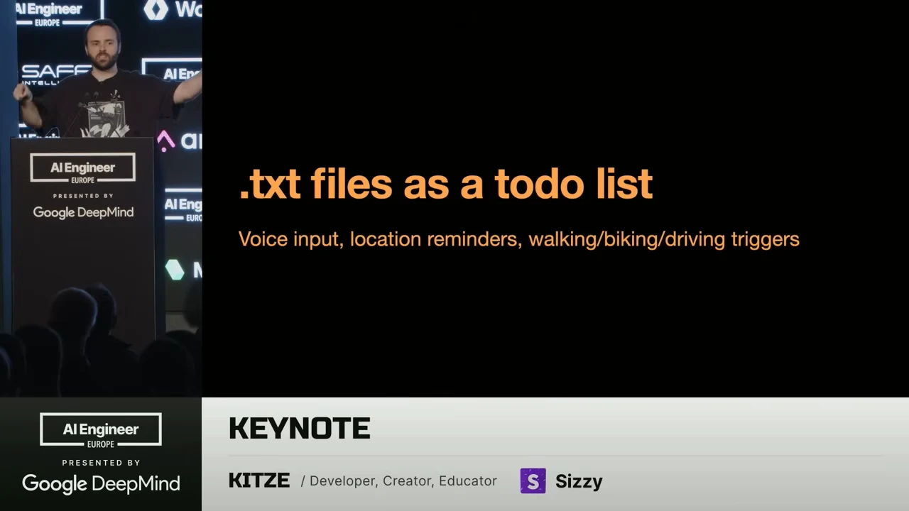 Kitze beside a slide reading “.txt files as a todo list,” with voice input, location reminders, and walking/biking/driving triggers listed underneath.