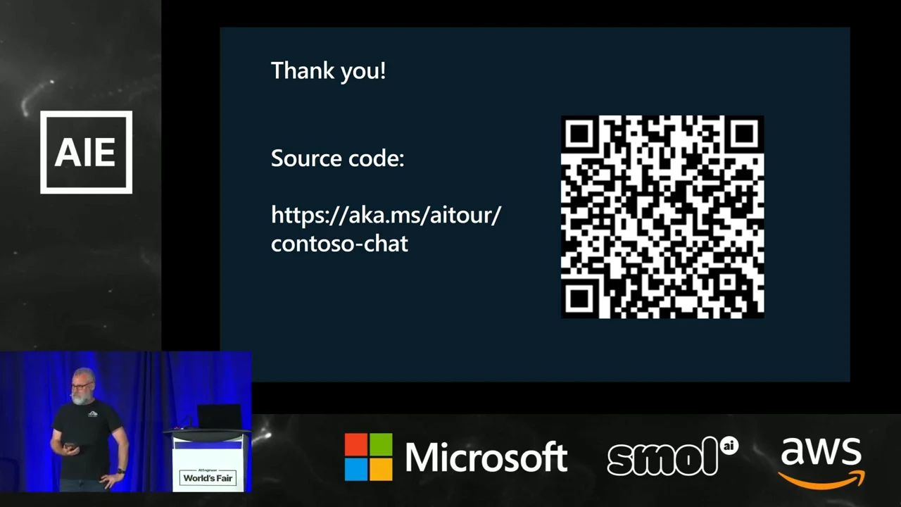 Thank-you slide displays https://aka.ms/aitour/contoso-chat beside a QR code, with a speaker inset and sponsor logos below.