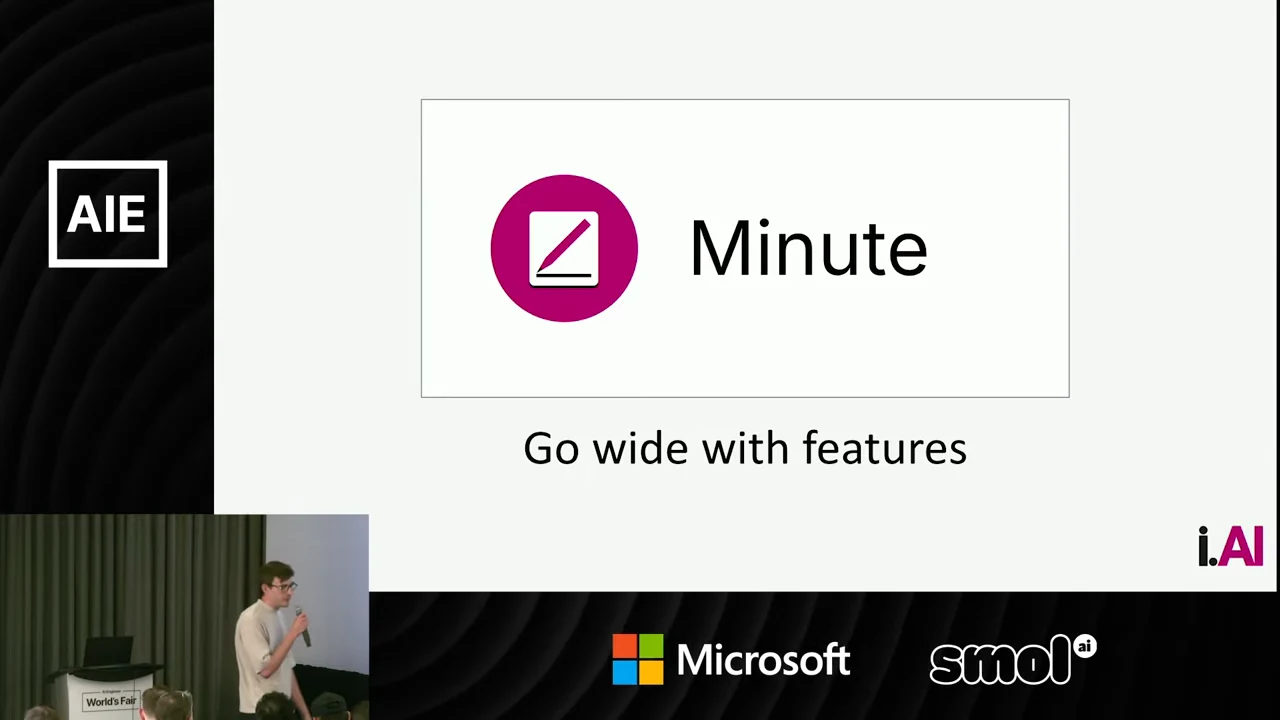 Slide showing the Minute name beside a magenta notebook icon, with “Go wide with features” below.