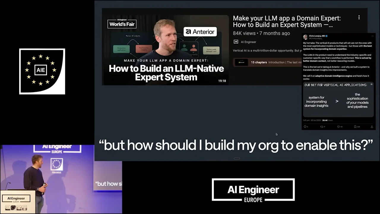 Slide showing a prior talk thumbnail about building an LLM-native expert system, a social post, and the question “but how should I build my org to enable this?”