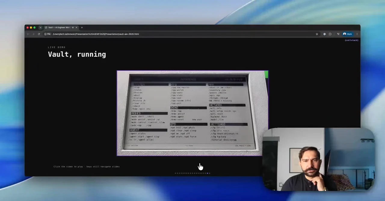 A close-up of Vault’s e-paper screen filled with a multi-column command listing beneath the slide title “Vault, running.”