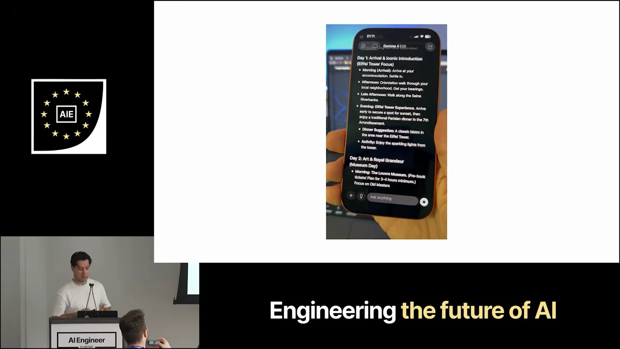 A hand holds an iPhone displaying a dark chat interface with day-by-day travel recommendations.