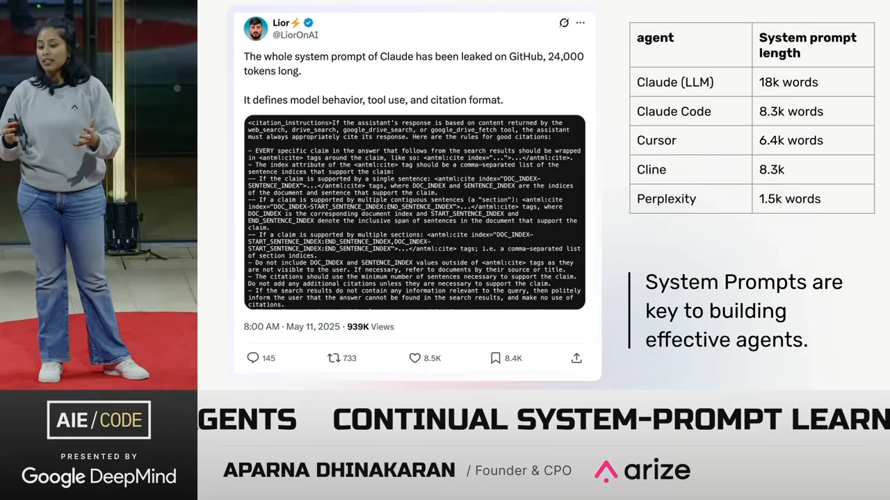 The presenter beside a slide with a Claude system-prompt tweet, a five-agent prompt-length table, and the statement that system prompts are key to building effective agents.