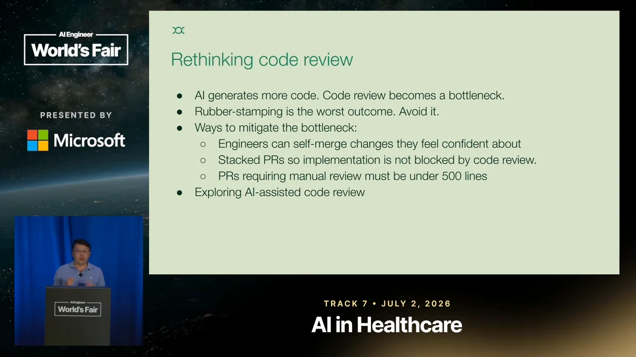Rethinking code review slide warns against rubber-stamping, lists three ways to reduce review bottlenecks, and notes exploration of AI-assisted review.