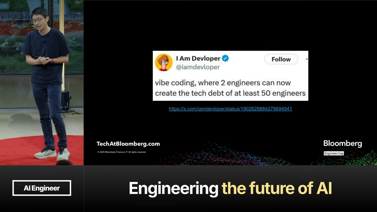 Slide displaying an I Am Devloper post: “vibe coding, where 2 engineers can now create the tech debt of at least 50 engineers.”