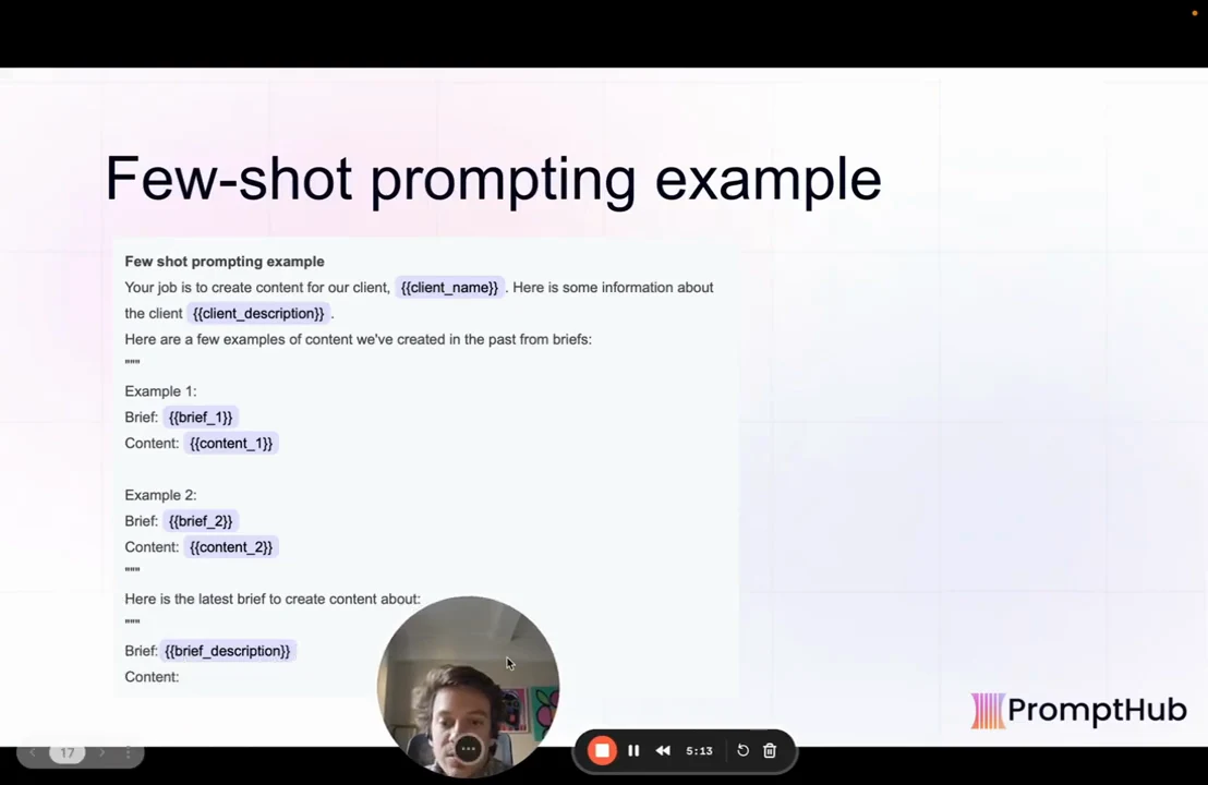 Slide titled “Few-shot prompting example” shows client placeholders, two example brief–content pairs, and a final brief followed by Content. The presenter bubble sits toward the lower center.