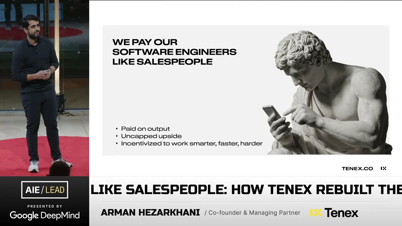 Slide lists paid on output, uncapped upside, and incentives to work smarter, faster, harder, beside a statue using a phone.