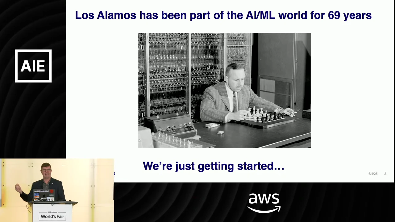 Slide stating that Los Alamos has been part of the AI/ML world for 69 years, with a black-and-white photograph of a man at a chessboard beside computer equipment.