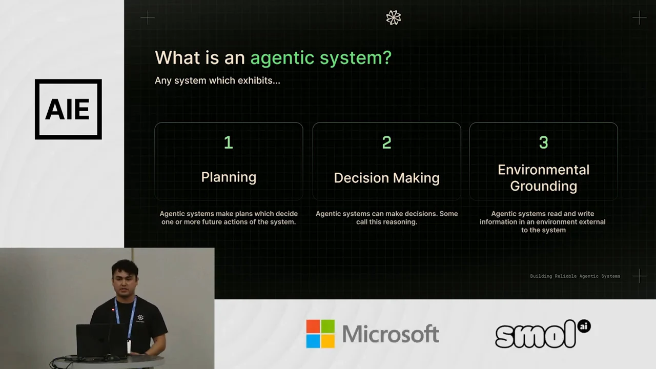 Slide titled “What is an agentic system?” with three numbered boxes for Planning, Decision Making, and Environmental Grounding.