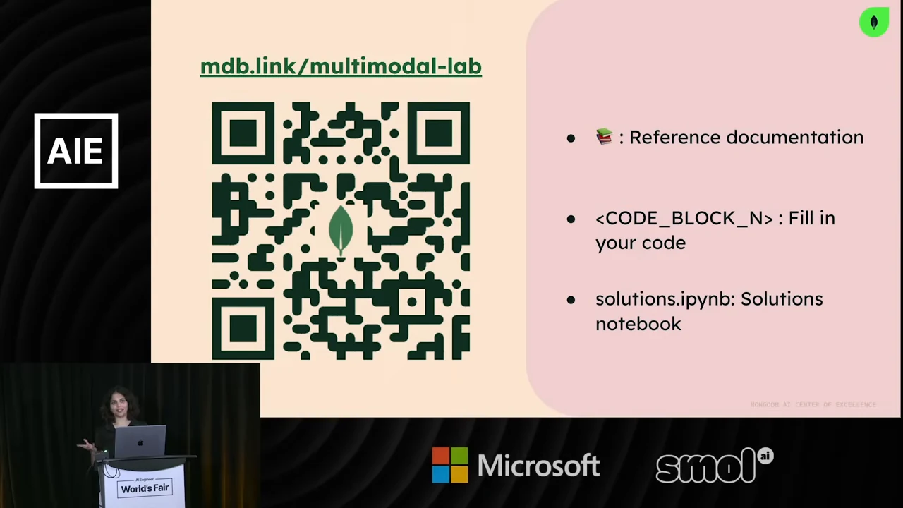 Slide showing mdb.link/multimodal-lab above a QR code, plus notes for reference documentation, CODE_BLOCK_N placeholders, and solutions.ipynb.